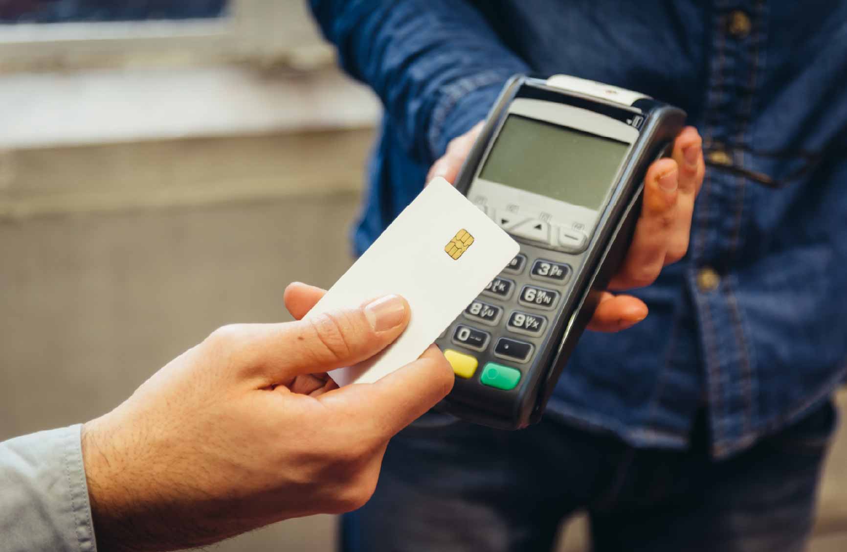 Person paying with credit card