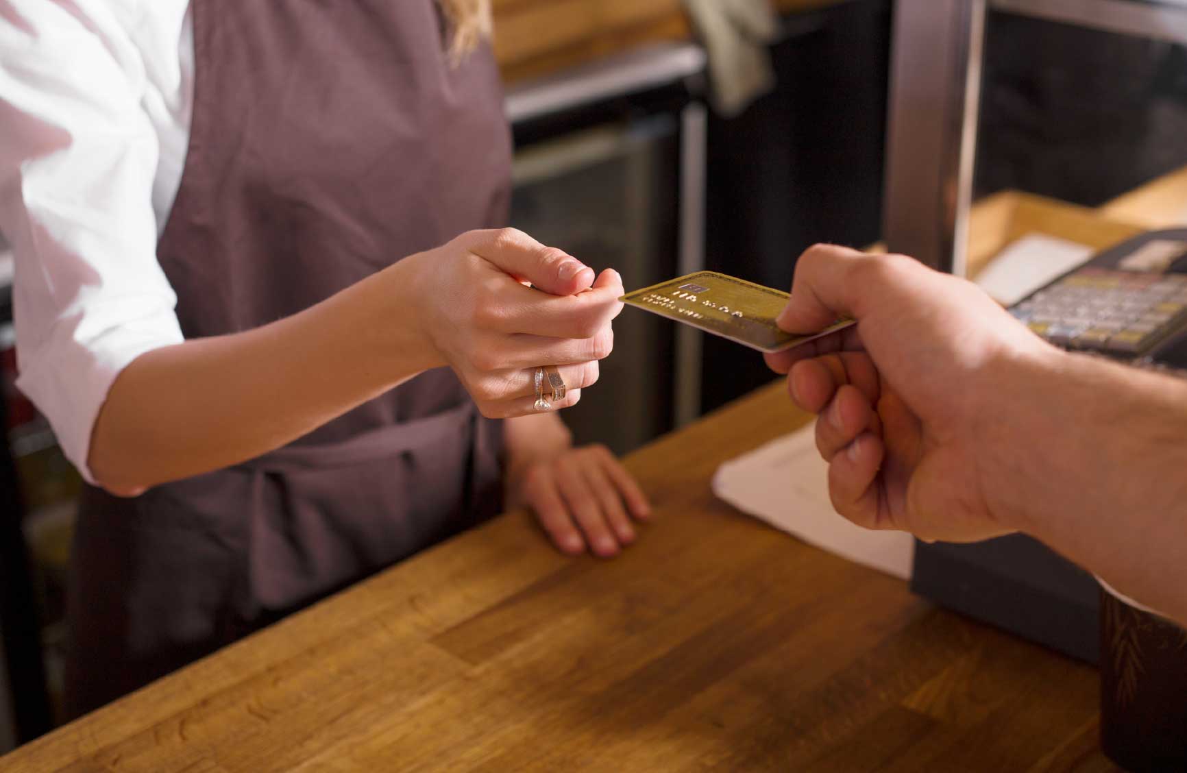 person paying with credit card