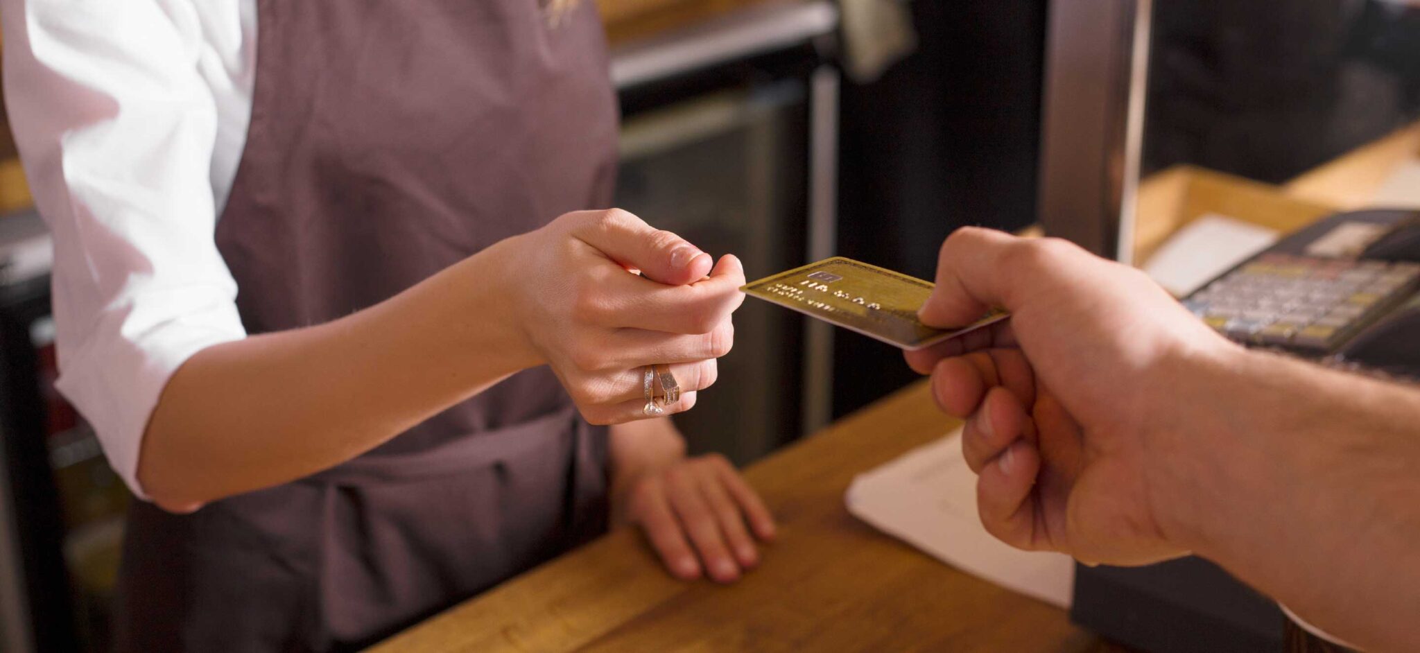 person paying with credit card