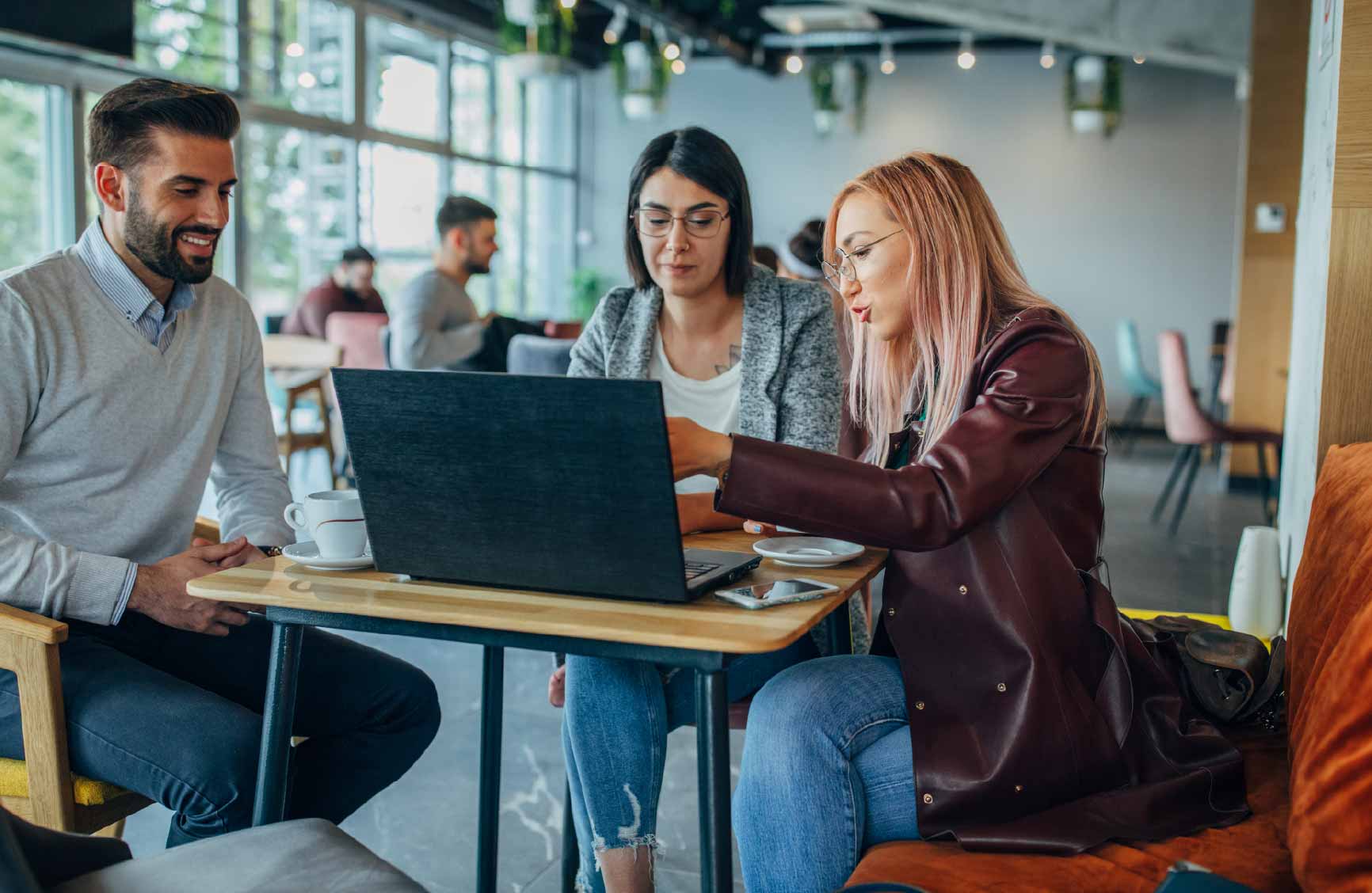 Team working together on a laptop